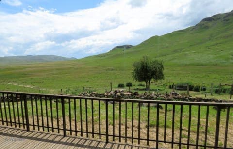 View from Ntsikeni Lodge deck across open grasslands