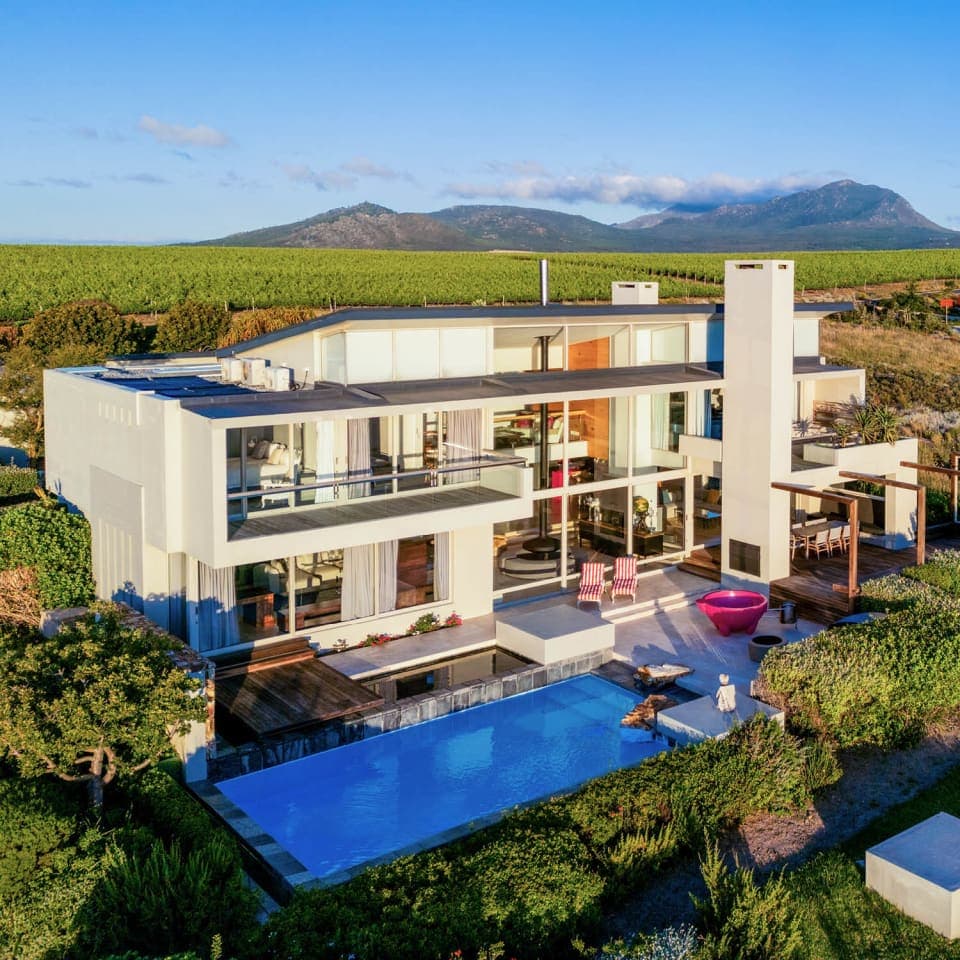 Aerial view of a villa among the vineyards at Benguela Cove Lagoon Wine Estate